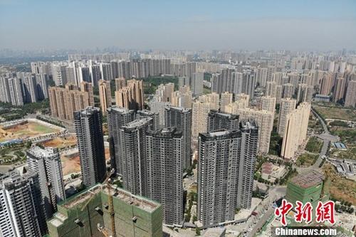 资料图为成都一处在建楼盘。<a target='_blank' href='http://www.chinanews.com/'>中新社</a>记者 张浪 摄