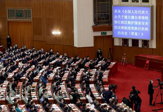 The closing meeting of the third session of the 13th National People's Congress is held at the Great Hall of the People in Beijing, capital of China, May 28, 2020. (Xinhua/Ding Haitao)